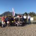 Un gruppo di studenti dell’Istituto Comprensivo di Praia a Mare tra di Gigli di Mare con i volontari di Italia Nostra